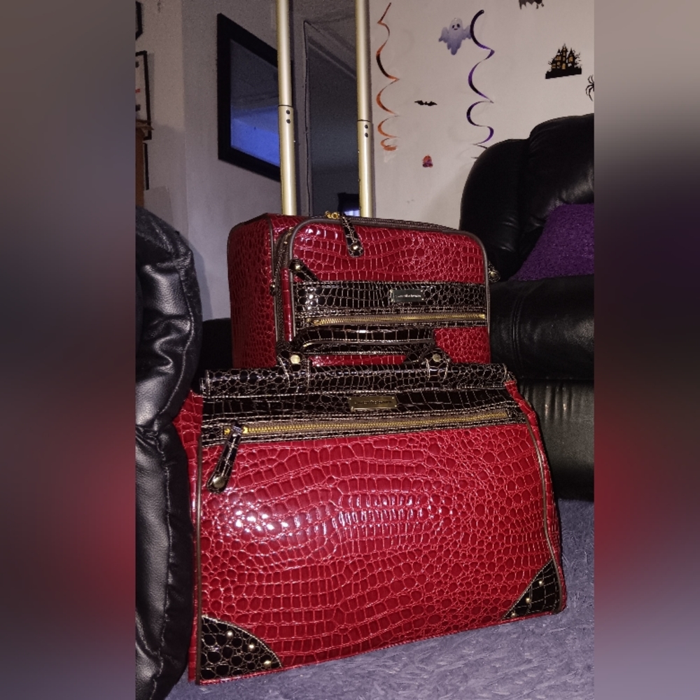 Samantha  Brown red suitcase